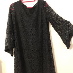 Cute black lined dress.